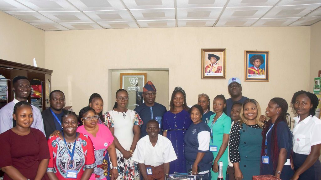 Staff celebrate Ag. Registrar, Olufemi Adebowale on his birthday anniversary